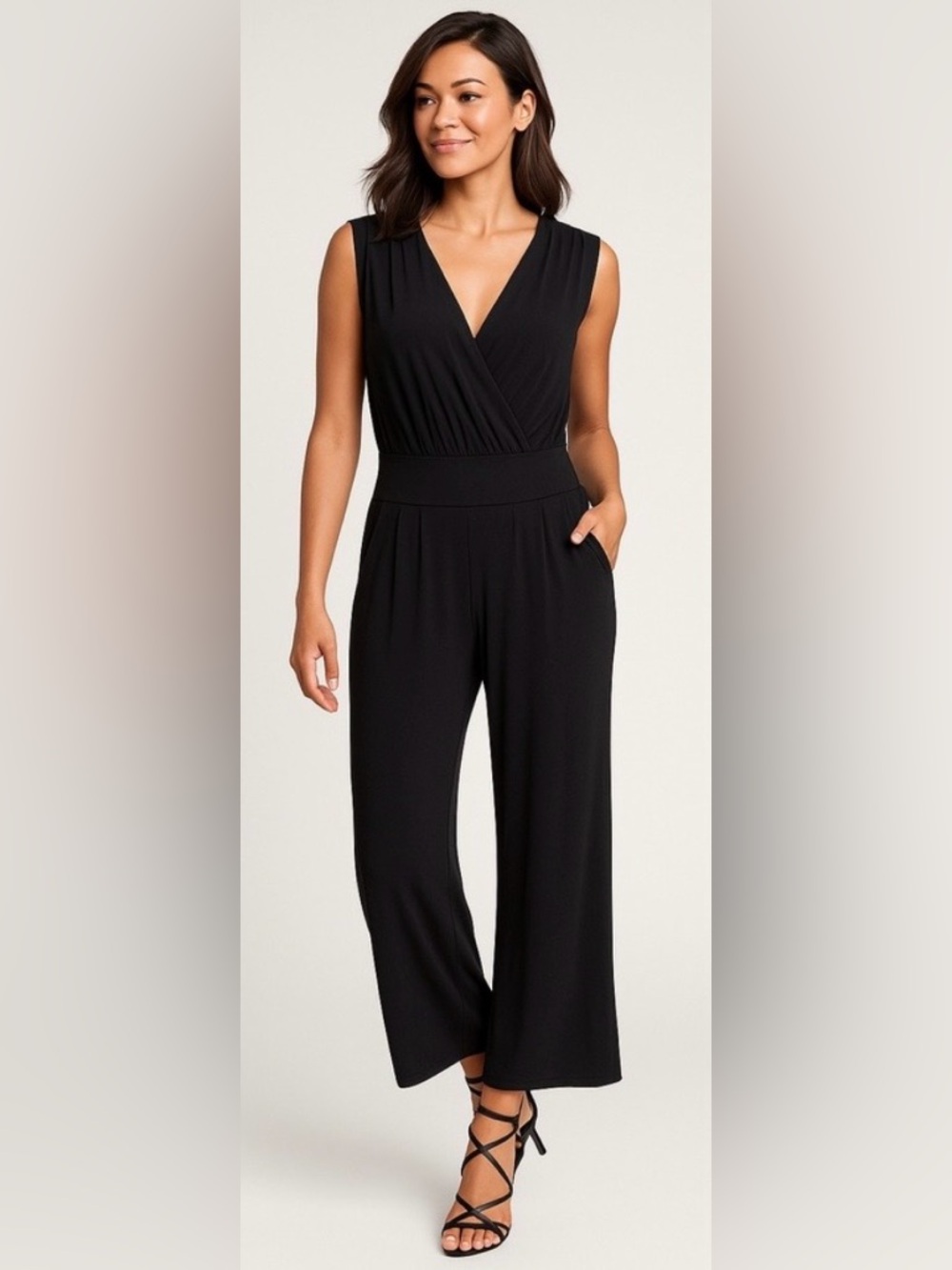 CAbi Women's Black Sleeveless Jumpsuit Size Small Wide Leg V- Neck Smocked Waist
